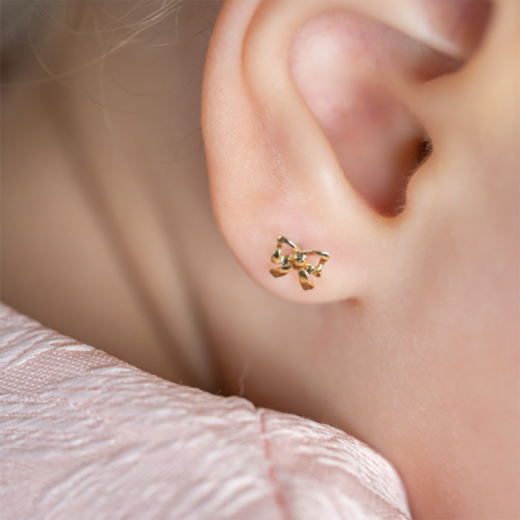 bow tie gold stud earrings